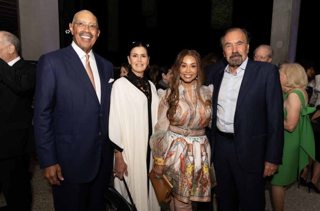 Eric Johnson, Darlene Pérez, Holly Gaines, & Jorge M. Pérez