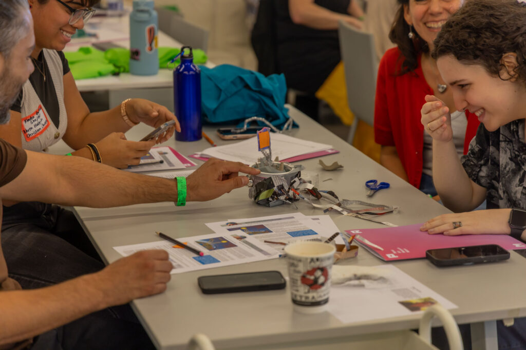 Four people enjoying an art and crafts activity